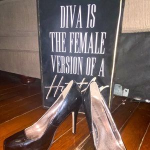 Black heels somewhat worn